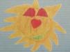 Logo børnetegning glad sol